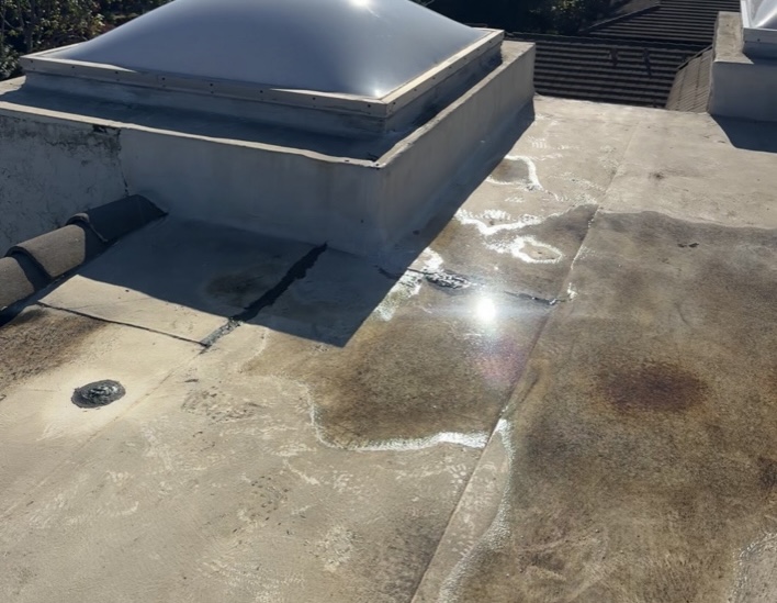 Water ponding on commercial flat roof